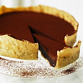 Chocolate tart, a piece cut