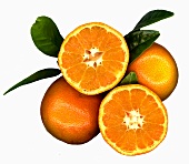 Mandarin oranges, whole and halved, with leaves