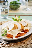 Chicken breast with Calvados, carrots and rice