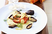 Lobster with mushrooms and cream sauce