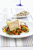 Haddock fillet with peppers and rice