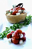 Lobster quiche with tomatoes and feta