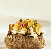 Baked Potato Topped with Veggies and Cheese