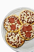 Four Mini Pizzas, Two Pepperoni and Two Cheese