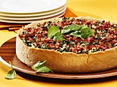 Spinach and rice tart with diced bacon