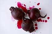 Three Whole Roasted Beets on White