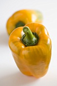 Two yellow peppers