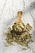 Fennel seeds on wooden spoon