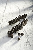 Bunches of black peppercorns