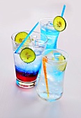 Three soda water drinks with lime