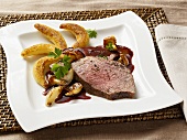 Beef with plum sauce and chanterelles