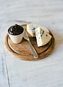 Blue cheese and jam on wooden board