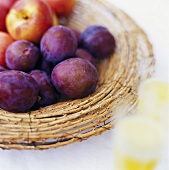 Plums in basket