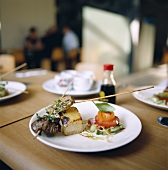 Skewers and salad in Asian restaurant