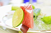 Piece of raw tuna with lime