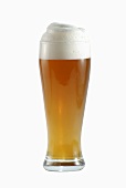 Glass of wheat beer with head (white background)