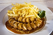 Currywurst (sausage with curry sauce and curry powder) and chips