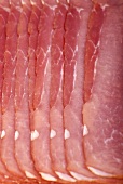Several slices of raw ham