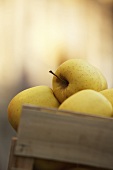 Golden Delicious apples in a crate