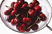 Freshly Washed Cherries in a Colander