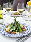 Asparagus and spinach salad with quail's egg, croutons & cheese dressing