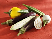 Various types of aubergines and okra pods