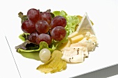 Cheese platter with grapes