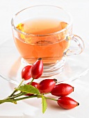 Rosehip tea in a glass cup (close-up)