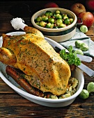 Goose with apple filling and bacon Brussels sprouts