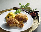 Chicken bits with an almond coating with pilau rice
