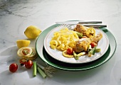 Lemon chicken with vegetables and tagliatelle