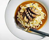 Chicken breast and goose liver with truffle sauce and tagliatelle