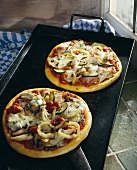 Two courgette pizzas with chicken