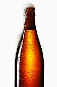 Beer frothing out of bottle