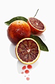 Blood oranges with drops of juice