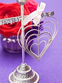 Wire heart with bow, posy of roses