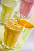 Orange smoothie, kiwi fruit smoothie and strawberry smoothie