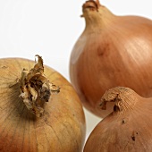 Three brown onions