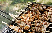 Chicken kebabs on a barbecue