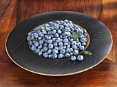 Blueberries in a wooden dish