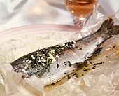 Trout baked in parchment paper