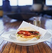 A smoked salmon and roasted red pepper sandwich