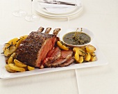 Fore rib of beef with roast potatoes and caper sauce