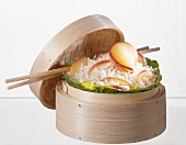 Rice with apple in steaming basket