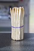 Bundle of Fresh White Asparagus Spears on Kitchen Counter