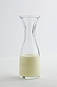 Milk in a glass carafe