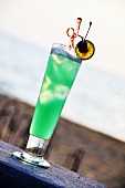 A tropical fruit cocktail with ice