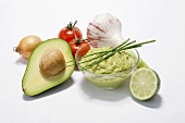 A dish of guacamole with ingredients