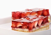 Two pieces of strawberry cake with gelatine