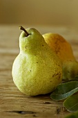 Green Pears on Wooden Table